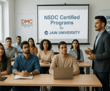 Instructor guiding students during an NSDC-certified program session by Jain University, conducted at DMC Finishing School Pvt. Ltd.