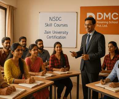 A group of Indian students attentively participating in a skill development class at DMC Finishing School Pvt. Ltd., guided by a professional trainer, with visible signage for NSDC Skill Courses and Jain University Certification.